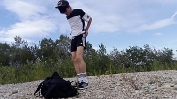 Ultra-cute lad Jon Arteen wears dark-hued Adidas outfit, displays his underwear, ambles freeballing, masturbating off throught his brief shorts, spunking outdoor